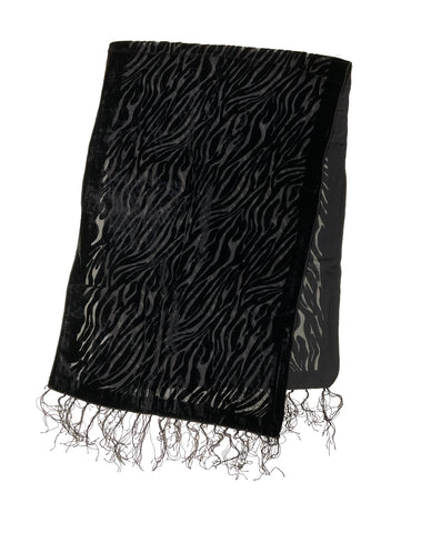 Black sheer scarf with velvet zebra pattern and fringes on a white background