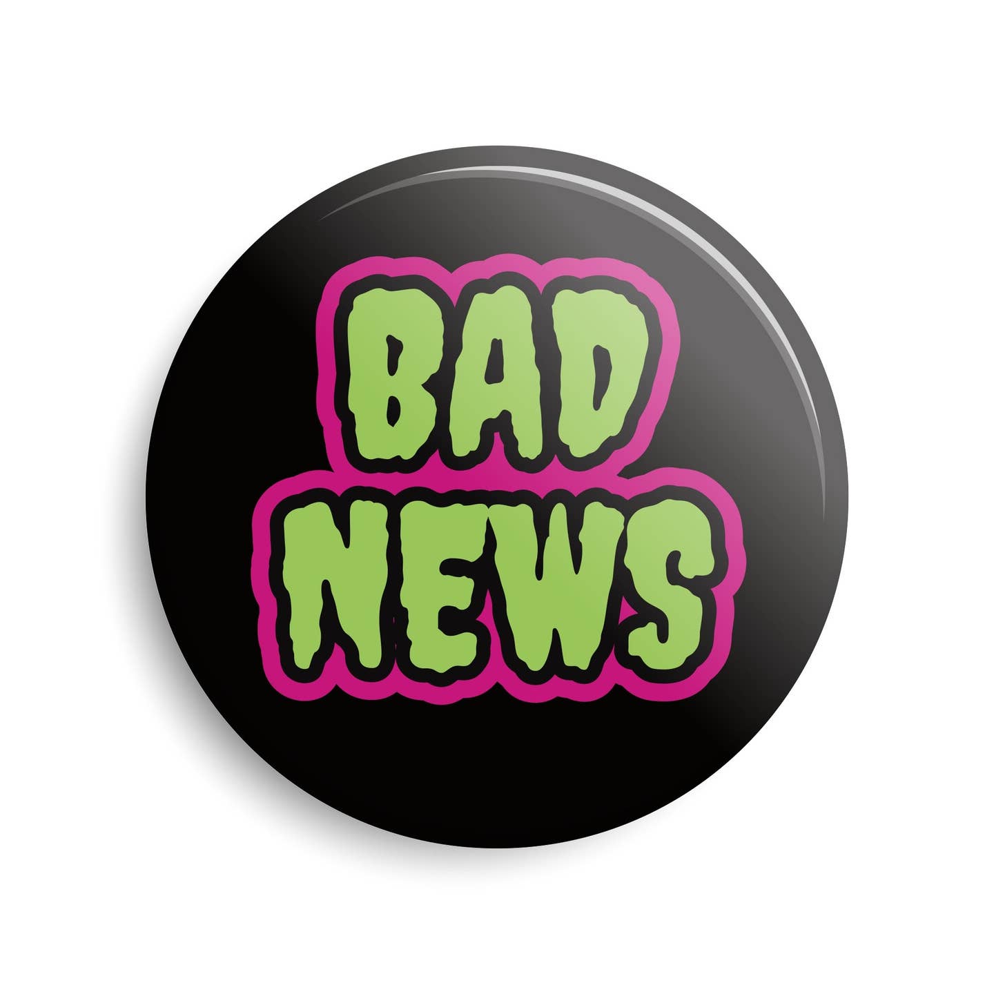 round 1.5" pinback button with black background and neon green and pink horror movie style font reading "BAD NEWS"