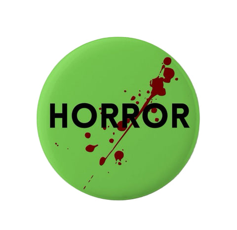 1.25” round pinback button with green background with 'Horror' text and blood splatter design