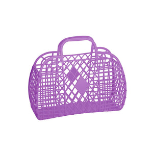 A small purple rectangular handbag made of plastic with a retro diamond and lattice pattern