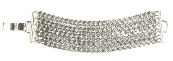 bracelet made of 5 rows of silver metal curb style chains with matching metal clasp closure. Shown flat in close up