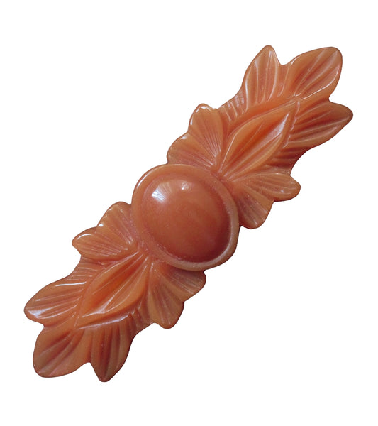 Butterscotch polyresin 3" x 1" rectangular leaf shaped hair accessory on pinch-release barrette. Shown from front