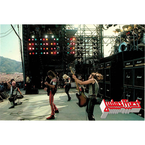 Postcard of Judas Priest onstage with band logo in bottom right 