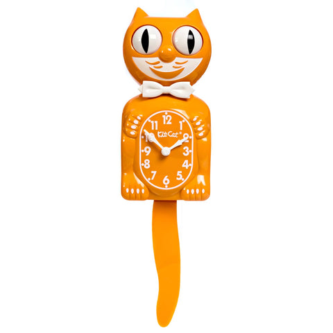 Medium orange colored cat clock with white features and white bow tie. Shown from front