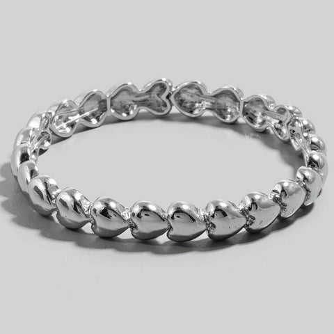 stretch bracelet made of small segments of silver metal hearts