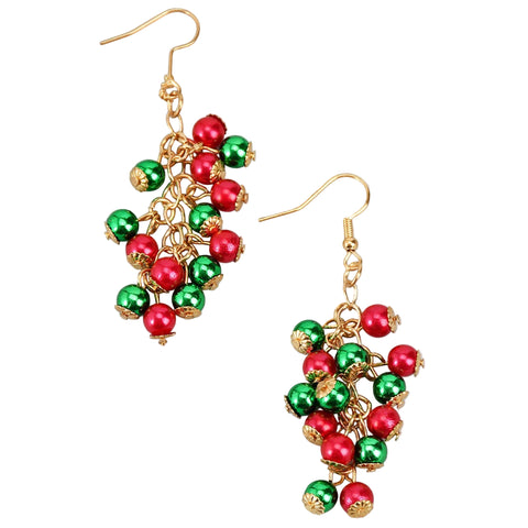 Pair of gold earrings with red and green beads resembling tree ornaments on a white background