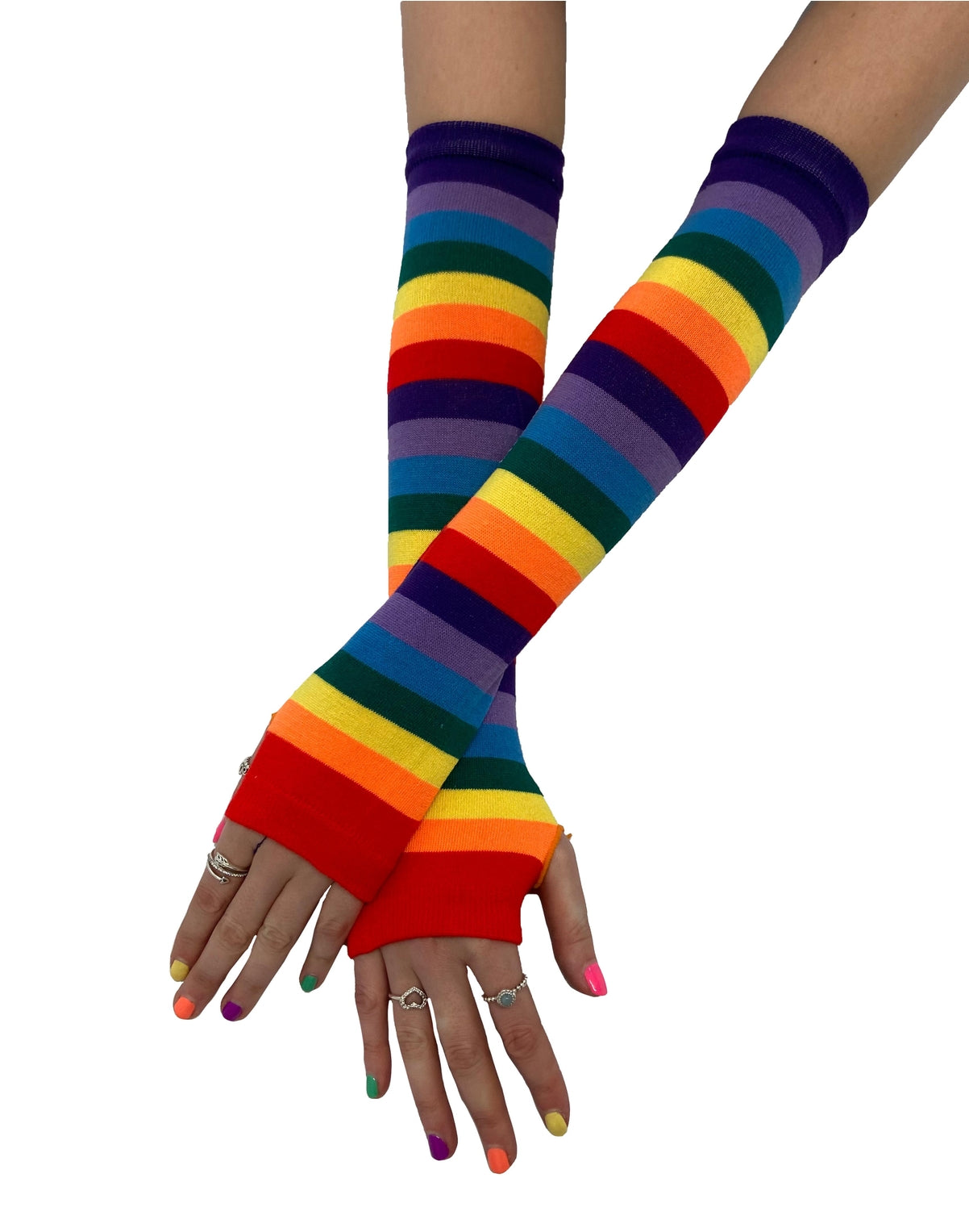 a model wearing elbow length rainbow striped knit fingerless gloves with thumb holes