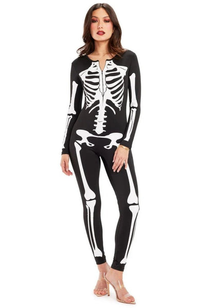 A model wearing a black stretch catsuit with a bright white stylized printed skeleton pattern and a front zip closure. Shown in a full length shot