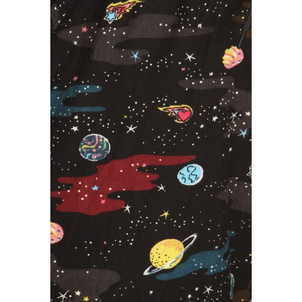 outer space pattern with planets, stars, and comets on a black background