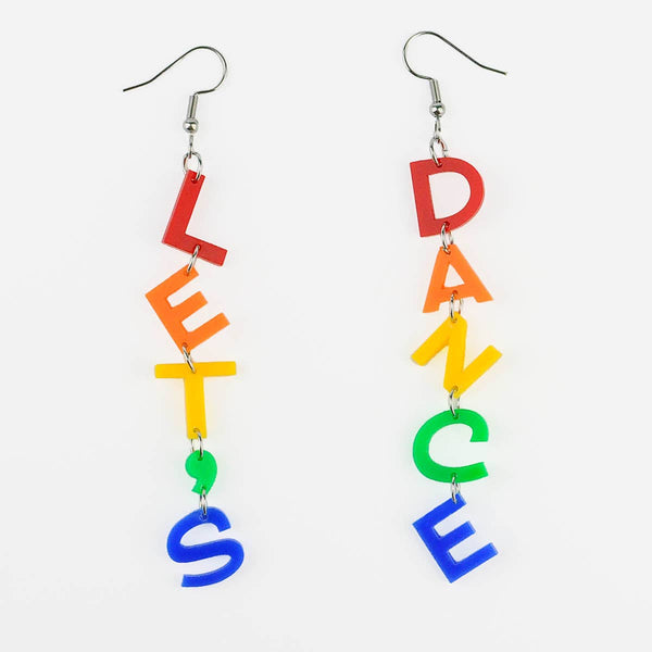'LET'S DANCE' earrings, one earring spelling out each word in rainbow laser cut acrylic letters, on a white background