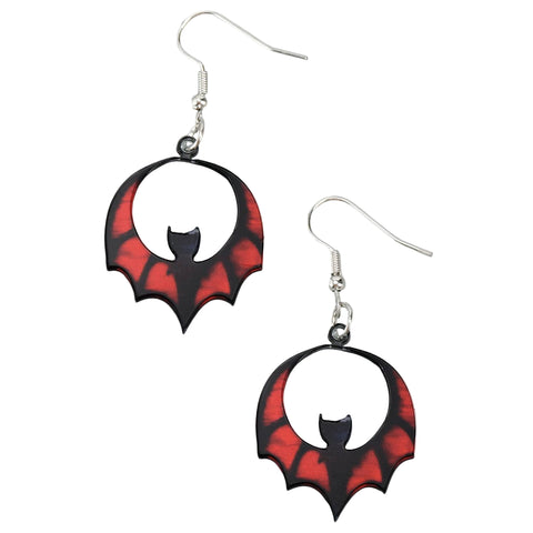 Bat-shaped earrings with red and black design on a white background