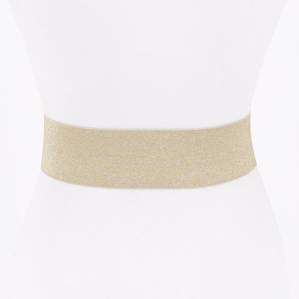 Metallic gold faux leather waist belt with large asymmetrical bow shown from back on dress form