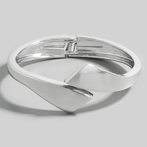 asymmetrical silver metal hinge closure bangle
