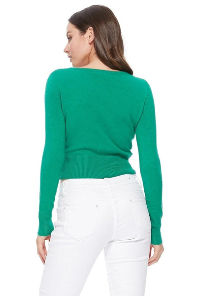 Model wearing a kelly green long-sleeve crew neck cardigan, shown from the back