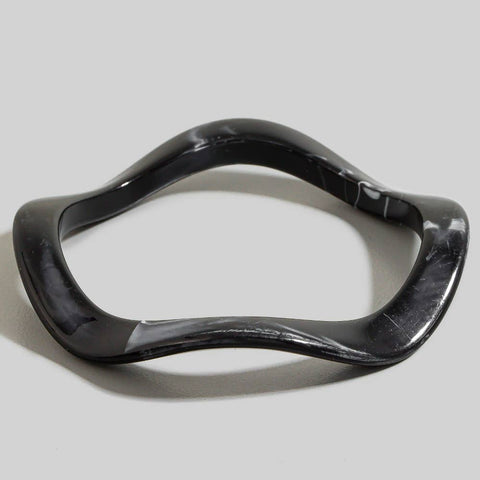wavy shaped resin bangle black with white marbling