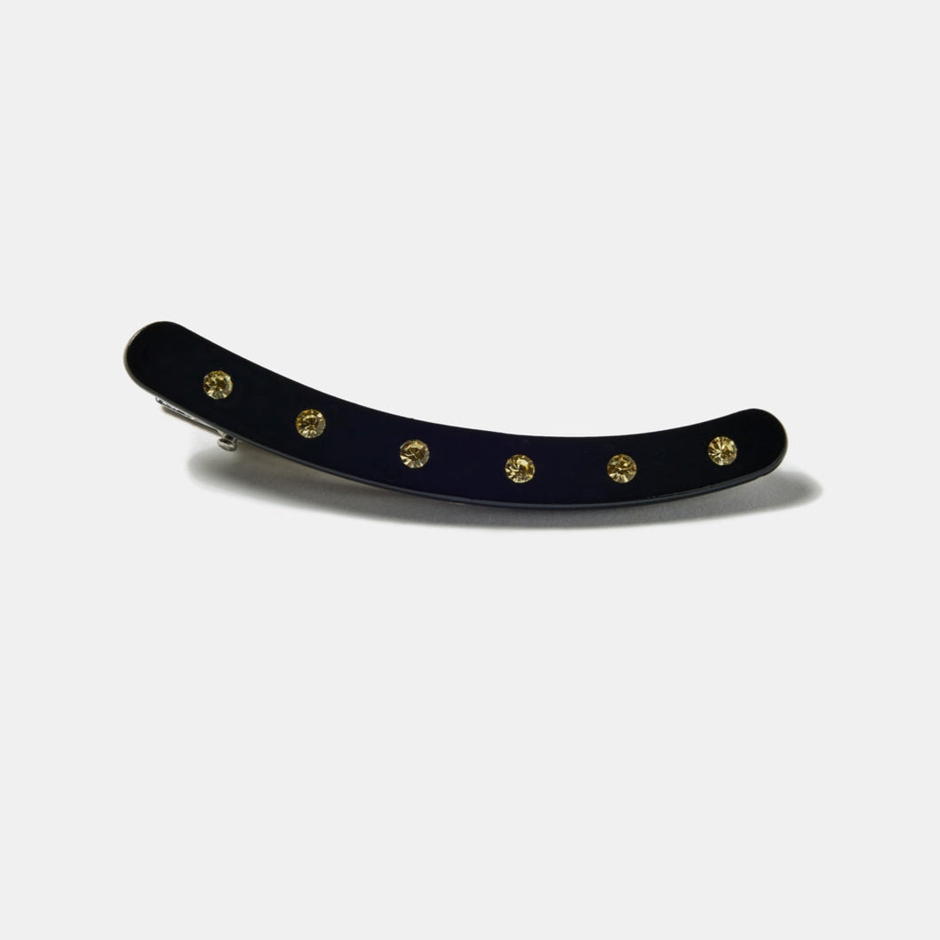 black acetate curved hair clip with flat top decorated with row of 6 clear rhinestones and alligator clip backing