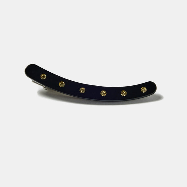 black acetate curved hair clip with flat top decorated with row of 6 clear rhinestones and alligator clip backing