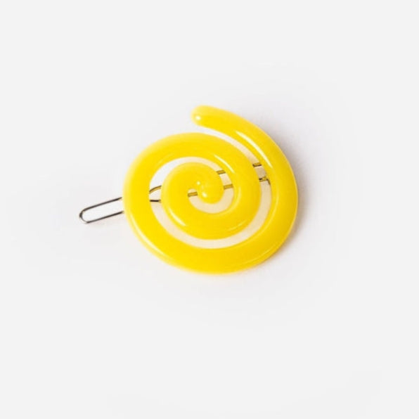 bright yellow acetate ball-and-clasp barrette in a rounded spiral shape. Shown flat