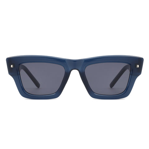 thick framed translucent navy blue wayfarer style sunglasses with silver square stud detail at each temple and arm with black smoke lenses. Shown from front