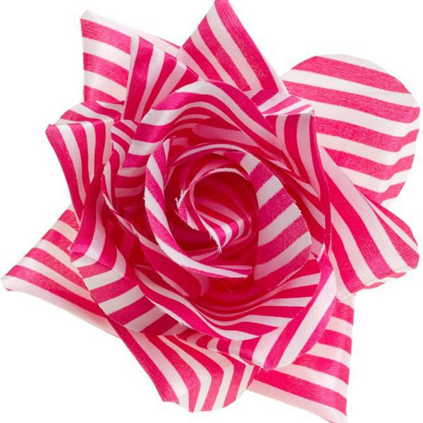 Pink and white striped rose-shaped fabric hair clip on a white background