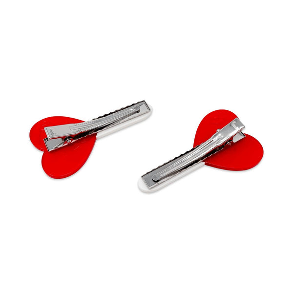 cellulose acetate hair clips in the shape of semi translucent red heart-shaped lollipops with sticks. Shown from back to display alligator clips