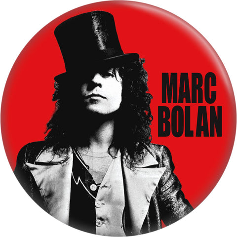 1.25” round pinback button with red background featuring photo of Marc Bolan in top hat with his name written in black capital letters 