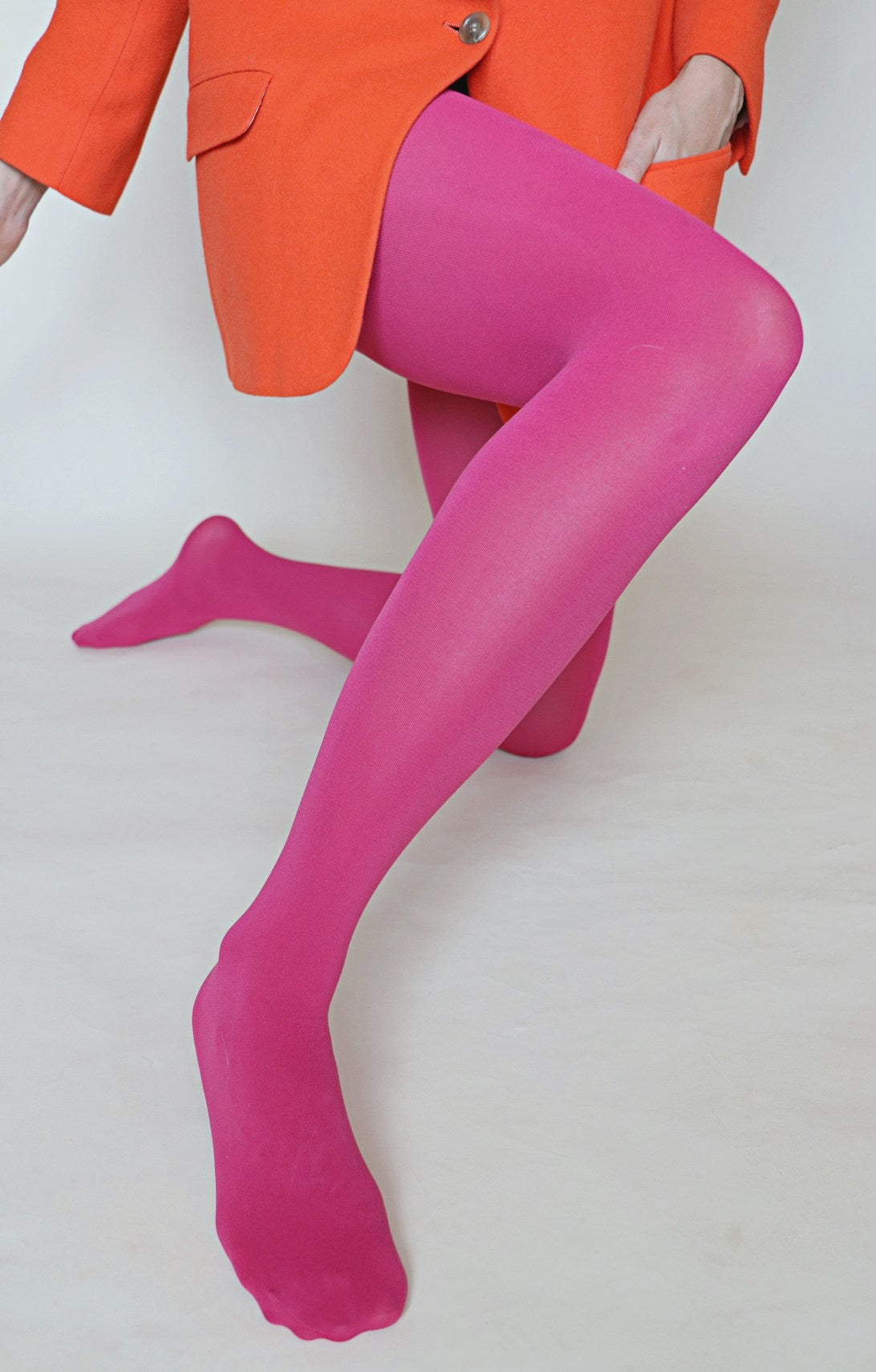80 denier matte finish "Zokki" opaque tights in bright berry pink, shown worn by a model