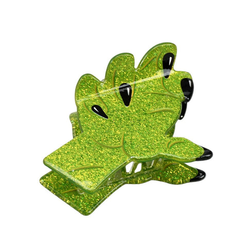 Green glittery hand with pointed black fingernails shaped hair clip