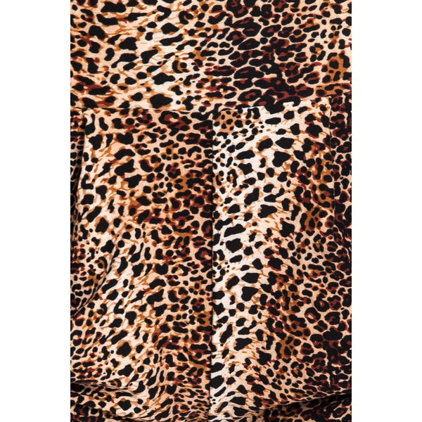 Brown and black vertically striped leopard print brushed fiber knit fabric shown in close up of pattern detail