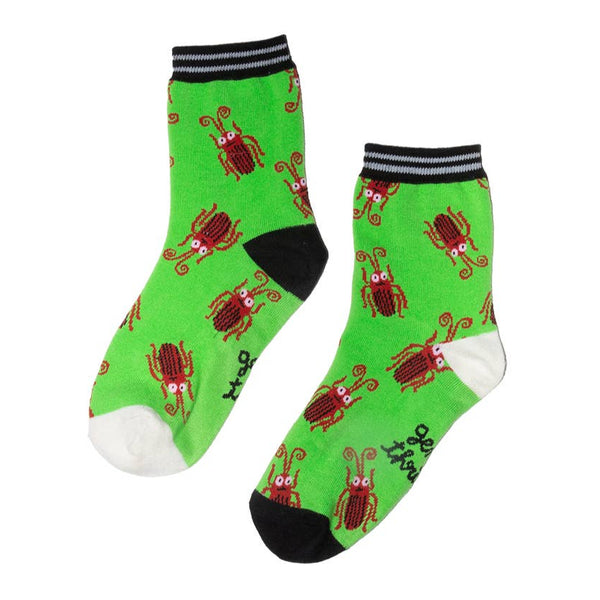 lime green crew socks with black and white striped cuffs and alternating black and white heels and toes, with an all-over pattern of brown cockroaches