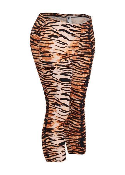 orange and black tiger print high waist capri length leggings shown from the side