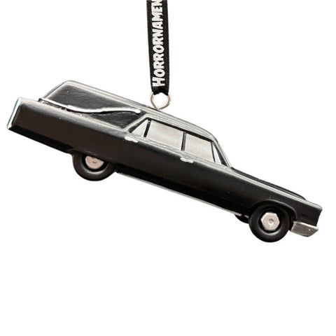 Black hearse ornament with black ribbon with 'Horrornament' text on a white background. Shown from side