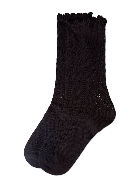 Black socks with textured knit pointelle pattern and ruffled cuff on a white background
