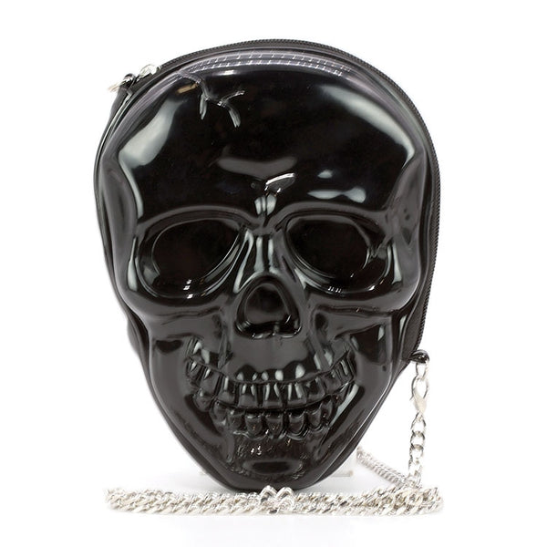 Black moulded plastic crossbody purse in the shape of a smiling skull with top zip closure and 28” silver metal curb chain strap. Shown from front