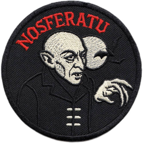 round black embroidered patch with image of Nosferatu in profile alongside moon and bats with "NOSFERATU" in red type