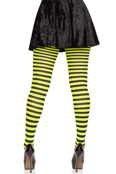 back view of model wearing black and green striped tights on a white background