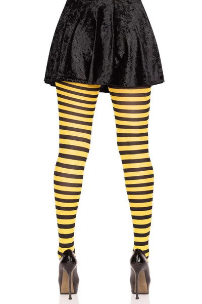 Striped opaque Nylon tights in black & yellow, shown back view on model