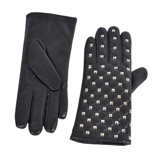 black faux leather wrist length gloves with quilted stitching and tiny silver metal pyramid studs. Shown flat with front and back of glove