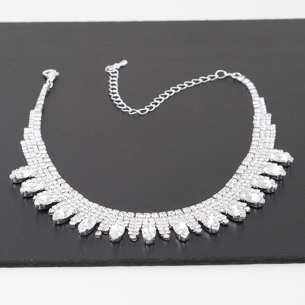 4 rows of square cut clear rhinestones choker with row of teardrop shaped matching jewels at the bottom