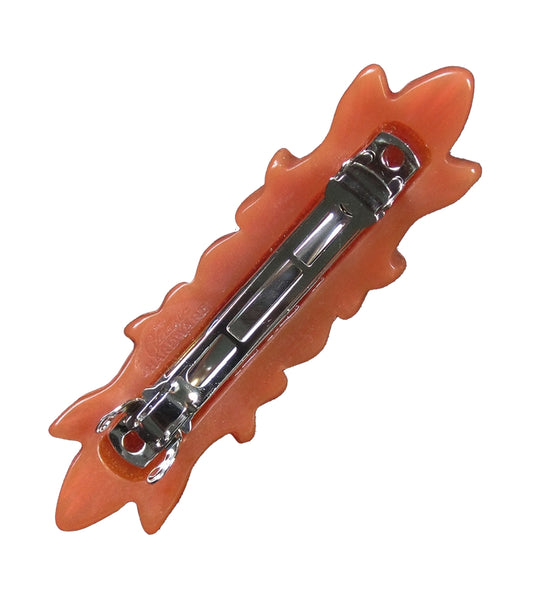 Butterscotch polyresin 3" x 1" rectangular leaf shaped hair accessory on pinch-release barrette. Shown from back