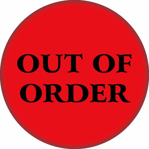 Round red magnet with “OUT OF ORDER” written on it 