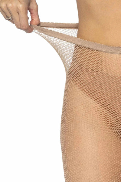 Close-up of a model wearing sheer beige fishnet stockings, pulling the waistband slightly outward with a hand, against a plain white background.