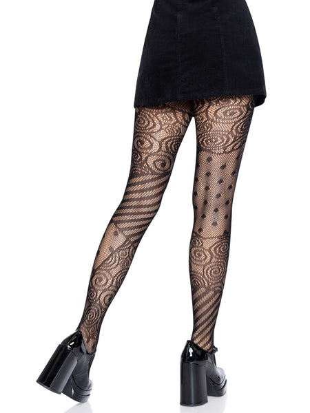 Black fishnet pantyhose with an allover knit-in patchwork design reminiscent of the patterns on Sally's dress in The Nightmare Before Christmas. Shown back view on a model from the waist down.