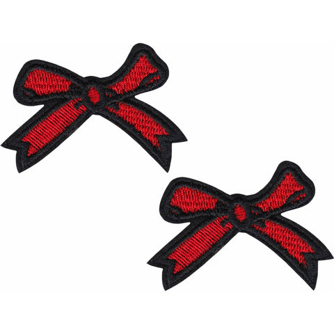 Set of two embroidered patches in the shape of bright red bows with thick black outlines