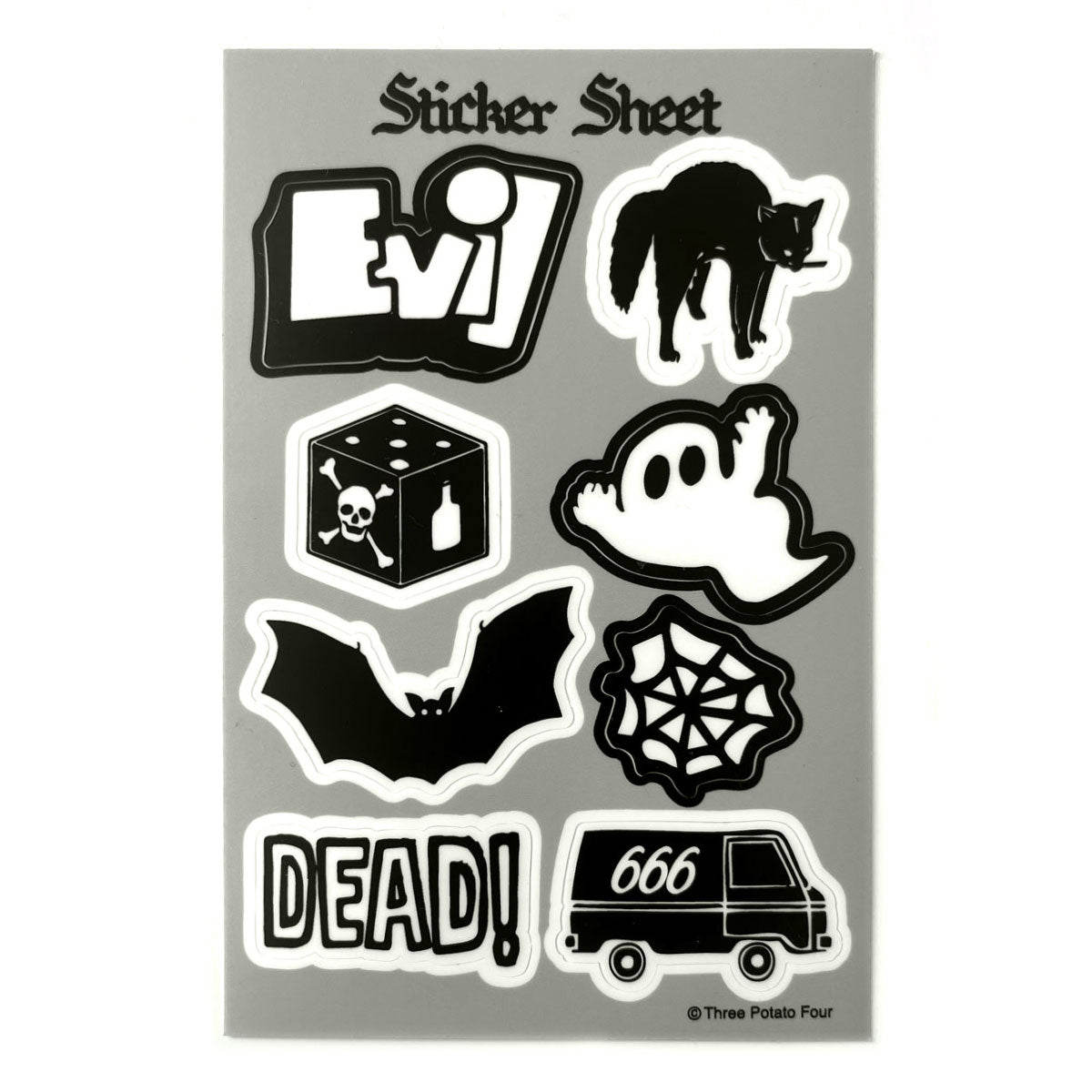 rectangular vinyl sheet of 8 black and white stickers on grey background -- "Evil", a black cat with arched back, a ghost, a spiderweb, a black van with 666 on its side, "DEAD!", a bat, and a die with a skull and crossbones on its side