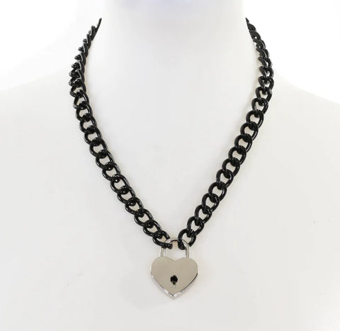 20” enameled black metal link chain with a 1” heart-shaped padlock in a shiny silver finish.