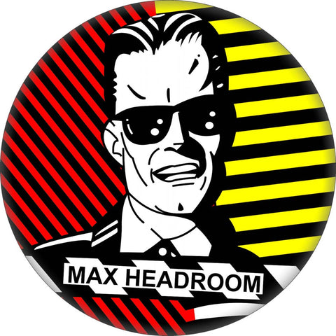 1 1/4” round Max Headroom on red and yellow geometric design pinback button