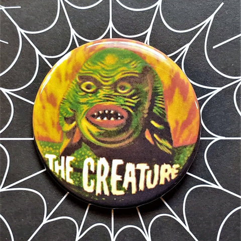 2.25” button of a colorful retro illustration of the Creature from the Black Lagoon