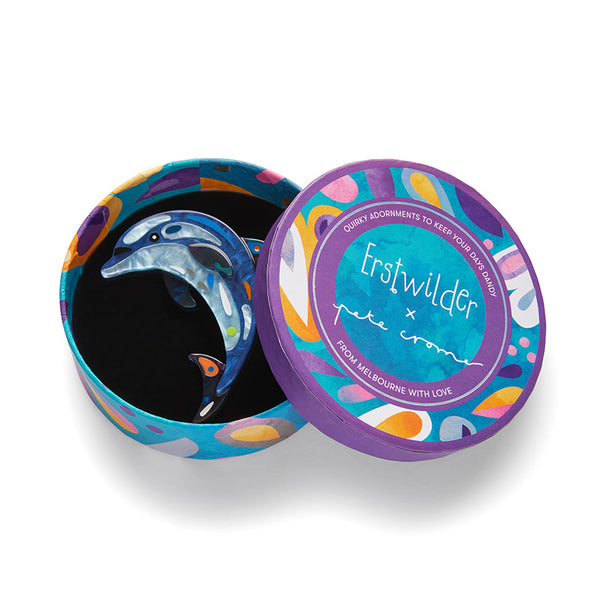 Pete Cromer x Erstwilder Australian Sea Life collaboration collection "The Boastful Bottlenose Dolphin" layered acrylic resin brooch, shown in illustrated round box packaging