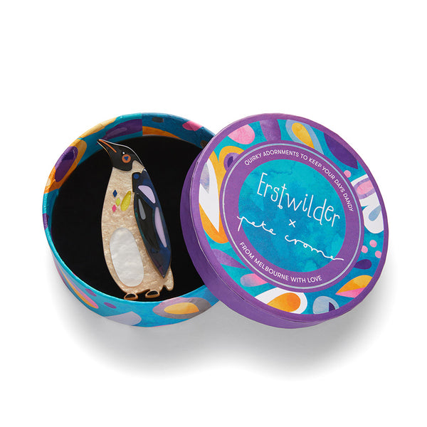 Pete Cromer x Erstwilder Australian Sea Life collaboration collection "The Emboldened Emperor Penguin" layered acrylic resin brooch, shown in illustrated round box packaging